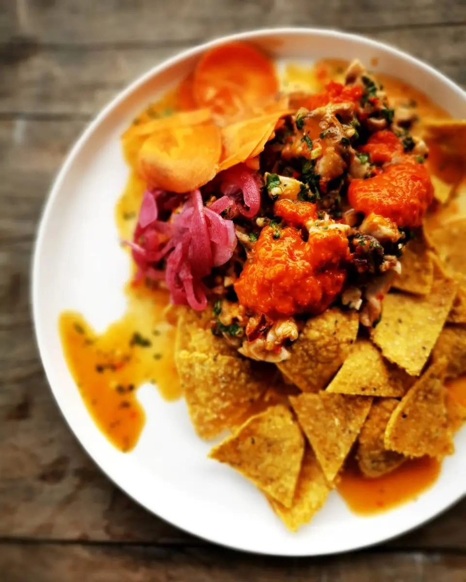 Ceviche with tortilla chips and dynamite pickled
