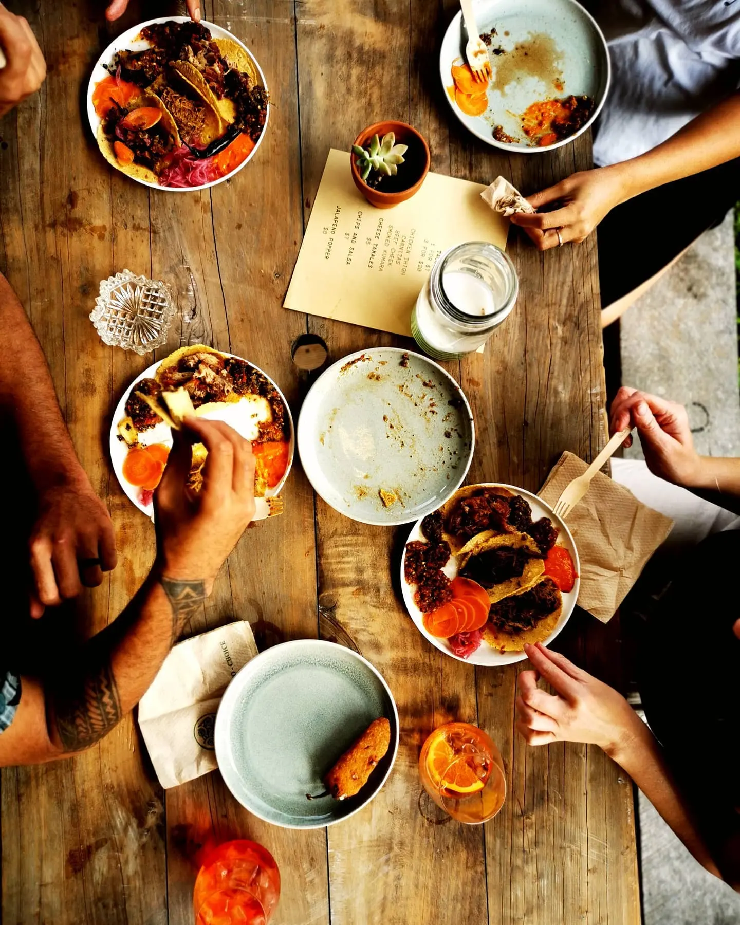 Three handmade tacos served fresh to order