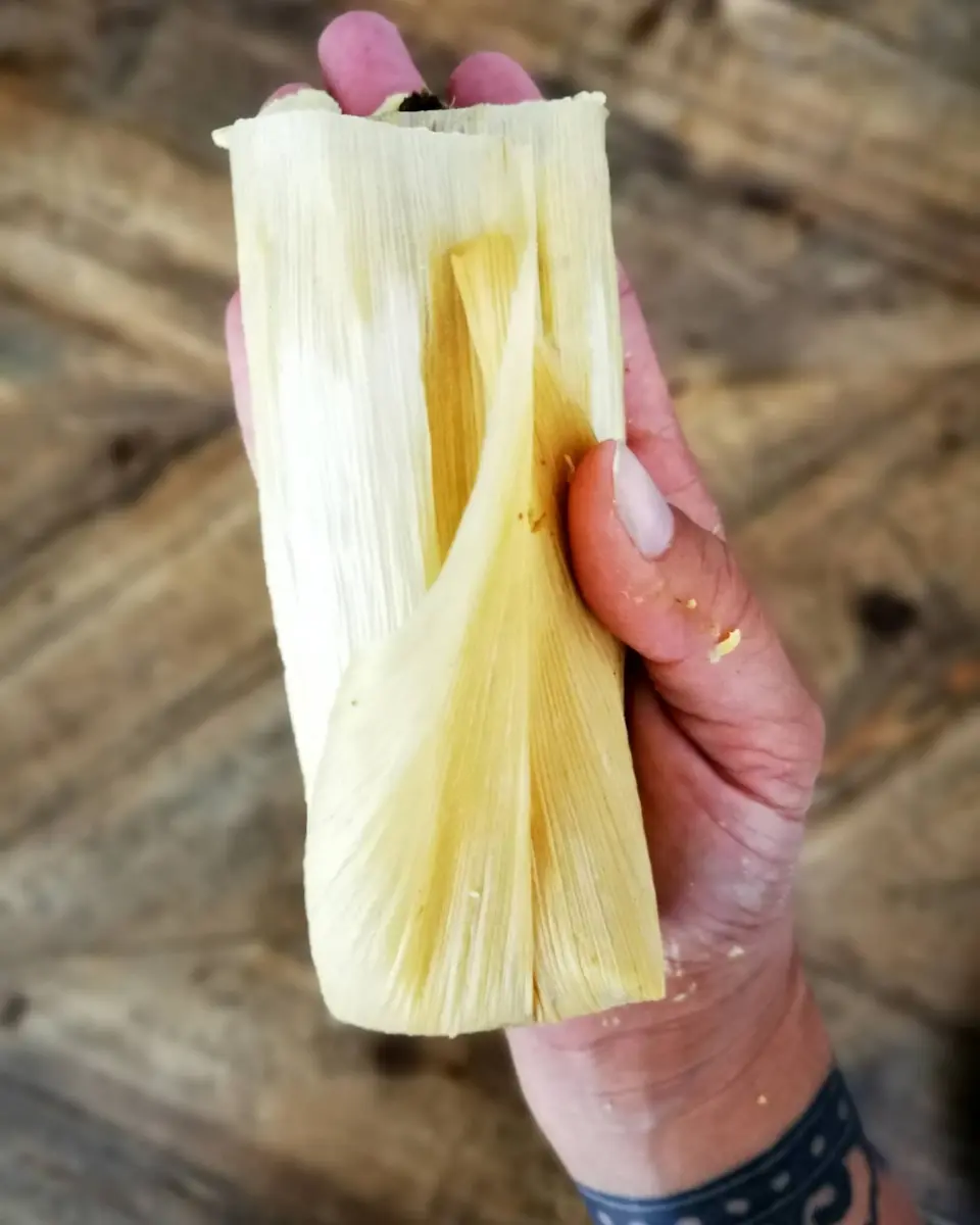 Tamale served with salsa